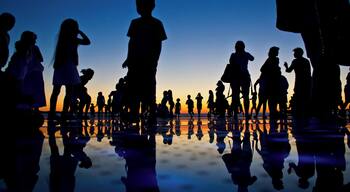 People reflections on colorful sunset in Zadar, Croatia. Reflections on "Greetings to the sun" solar installation powered by the Sun at day, and producing multiple colors at night.
#BVSBlue