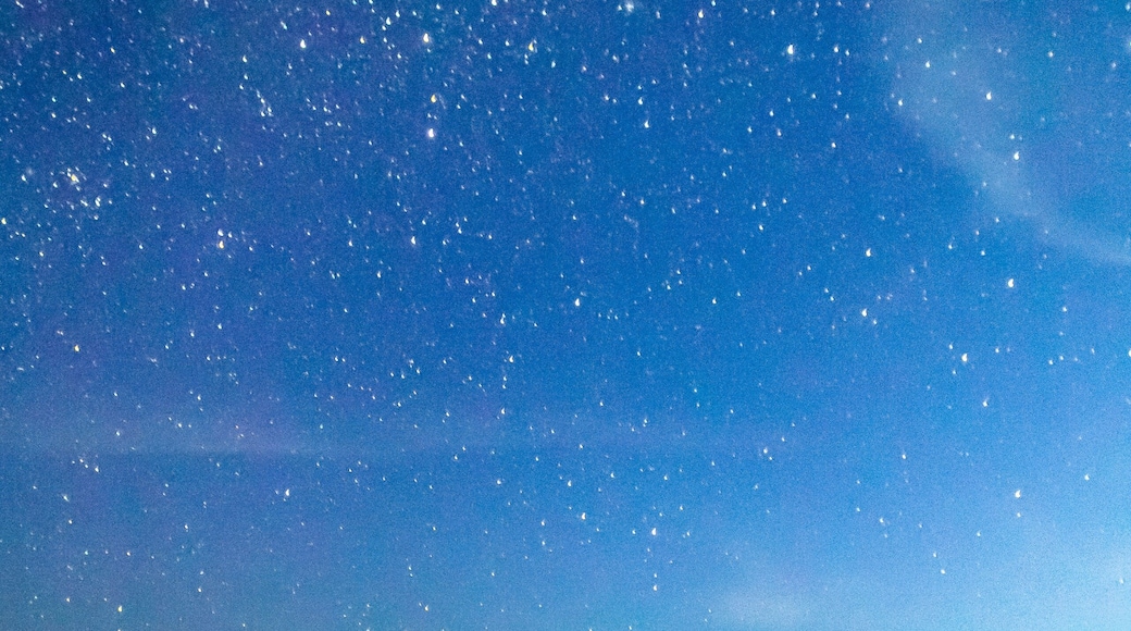 Lagoon at starry night with windmills on the shore, Laguna de los Gamboa in Monte Escobedo, Zacatecas