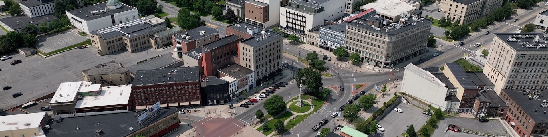 City aerial view of Watertown, NY living in small town USA with streets, buildings, business downtown in summertime in New York State close to Thousand Islands