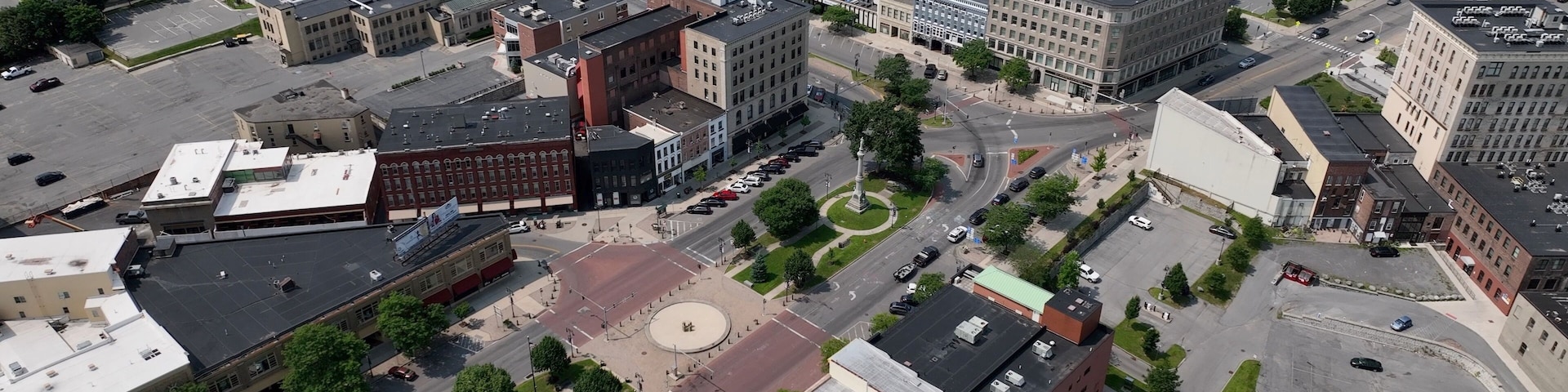 City aerial view of Watertown, NY living in small town USA with streets, buildings, business downtown in summertime in New York State close to Thousand Islands