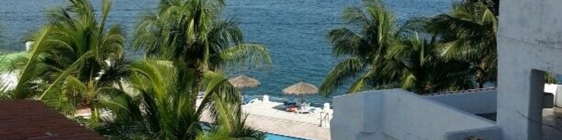 This is Actually...CONDOMINIOS PUERTO LAS HADAS room 554 (the condominium section.) OK to use Las Hadas pool, restaurant, etc for small fee