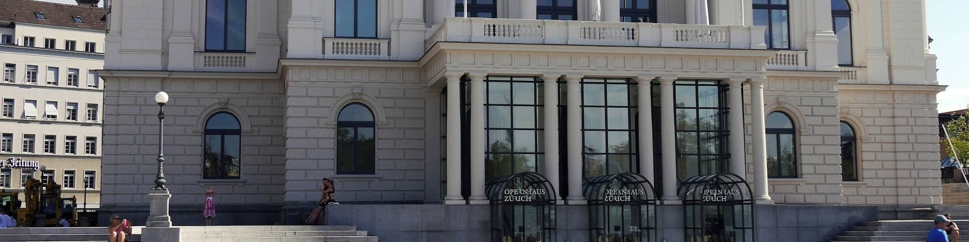 Very close to the shores of Lake Zurich the building sits on a large public square. Very clean and nice area.