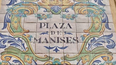 Ceramic tiles street sign of the Manises square in Valencia, Spain
