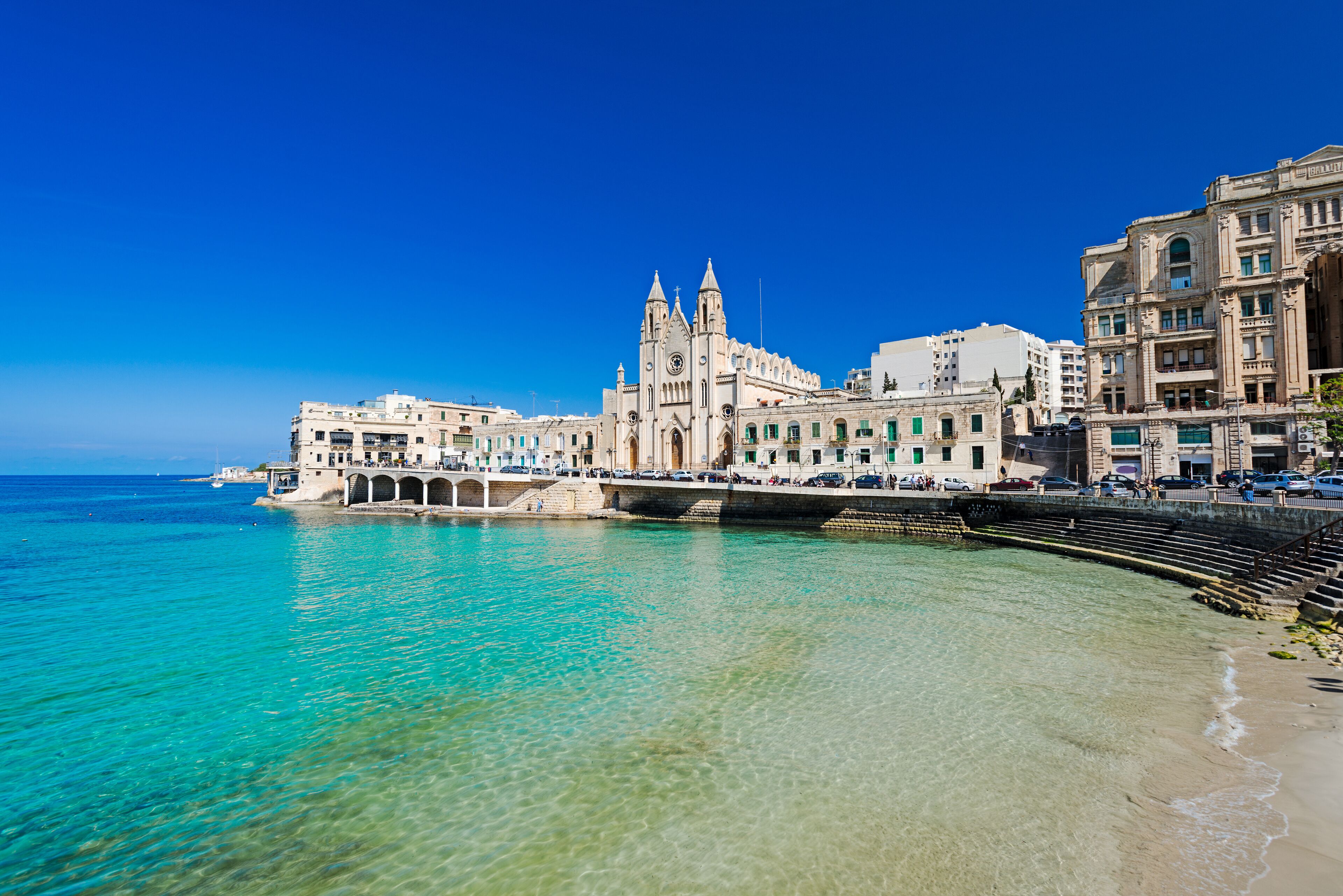 ST JULIANS, MALTA - APRIL 13, 2014: Our Lady of Mount Carmel Church on Balluta Bay in St. Julian's, Malta on April 13, 2014., Shutterstock ID 413998180, SF SSA Case with Manager Approval: Case 0715137