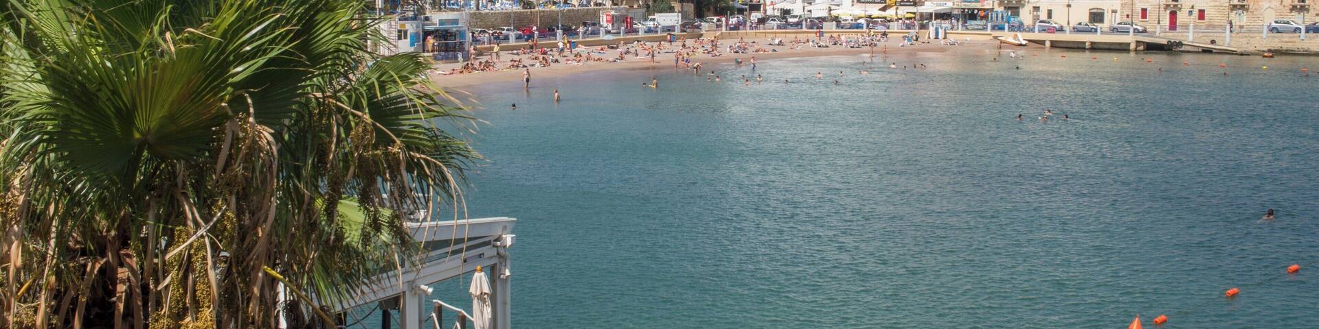 St. George’s Bay is located in Paceville, the entertainment capital of Malta. It is very crowded with tourists during summer. Arriving to the beach early is highly recommended, as it was full when we arrived around noon.