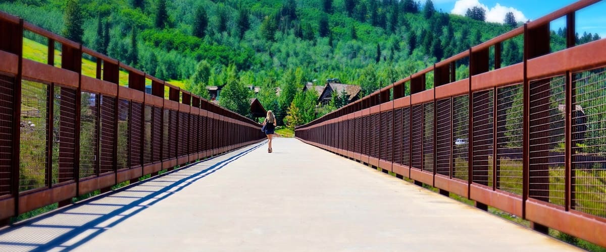 Aspen Colorado in the summer is beautiful, with plenty of hiking and biking trails.  Beginners can enjoy well kept, paved paths including this bridge over Maroon Creek near the Aspen Recreation Center.  #takeahike #perspectives
