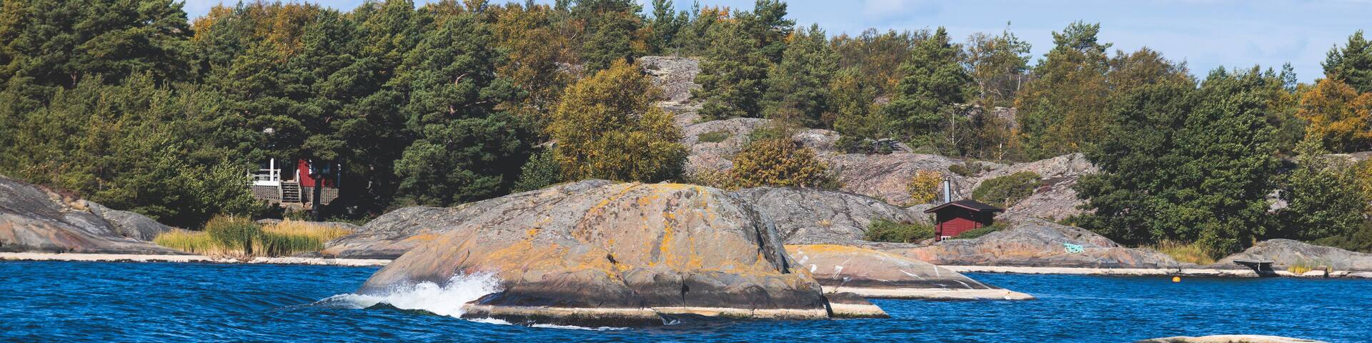 Archipelago National Park landscape, Southwest Finland, with islands, islets and skerries, Saaristomeren kansallispuisto, summer sunny day, view from shuttle ship ferry boat in the Archipelago Sea