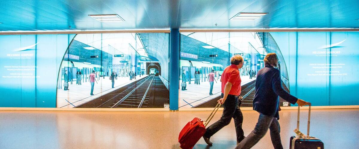 Vantaa featuring railway items and interior views as well as a small group of people