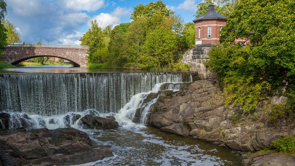 The picturesque view of Vanhakaupunki, the oldest part of Helsinki. The Vantaa river landscape, old hydroelectric power station