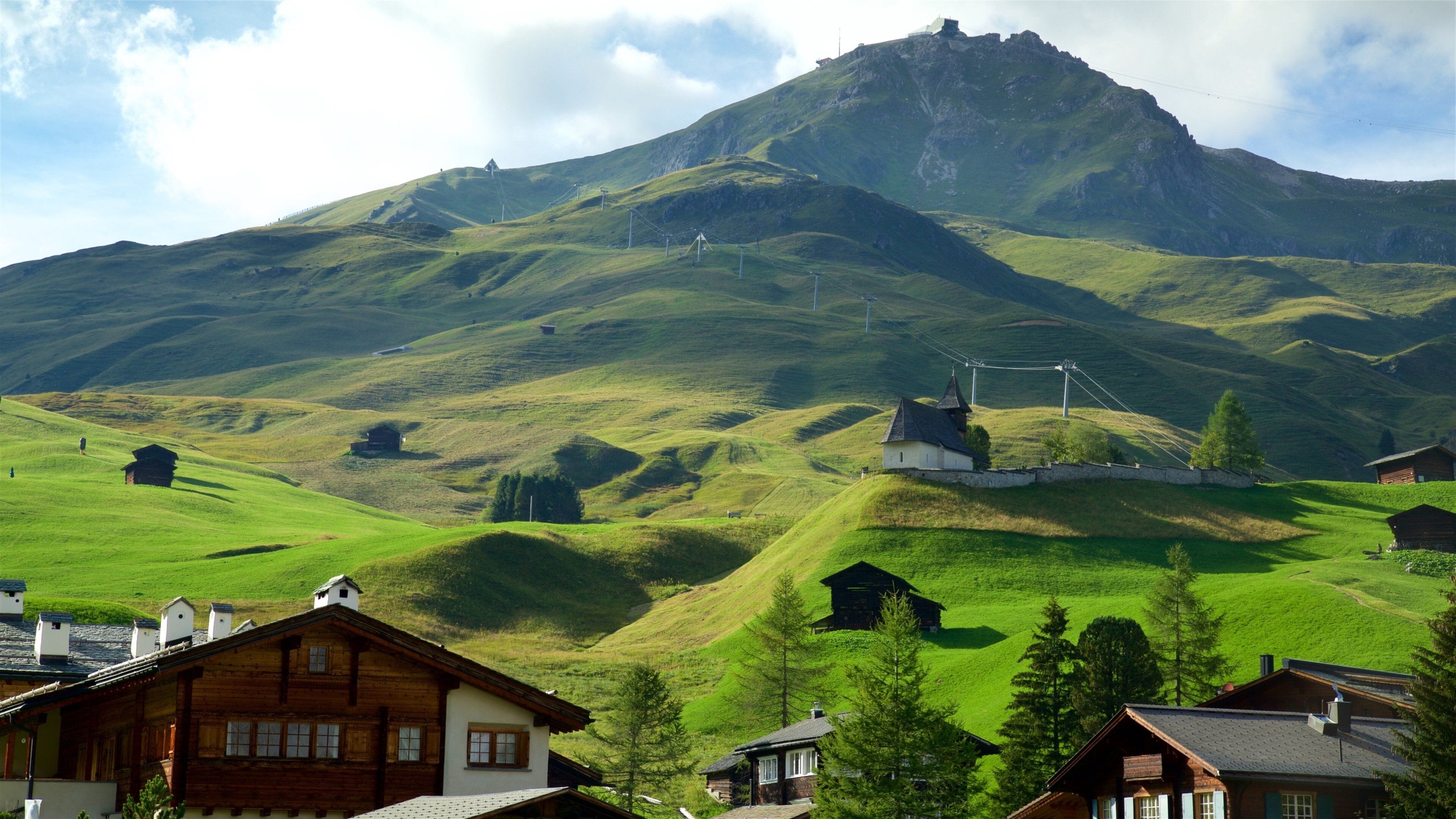 Arosa which includes mountains and tranquil scenes
