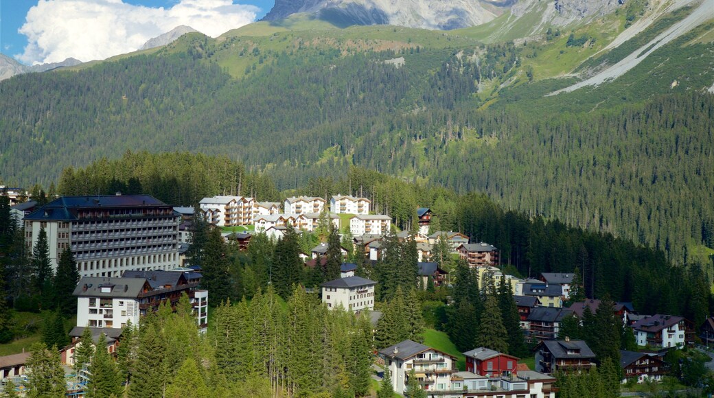 Arosa which includes a small town or village, tranquil scenes and landscape views
