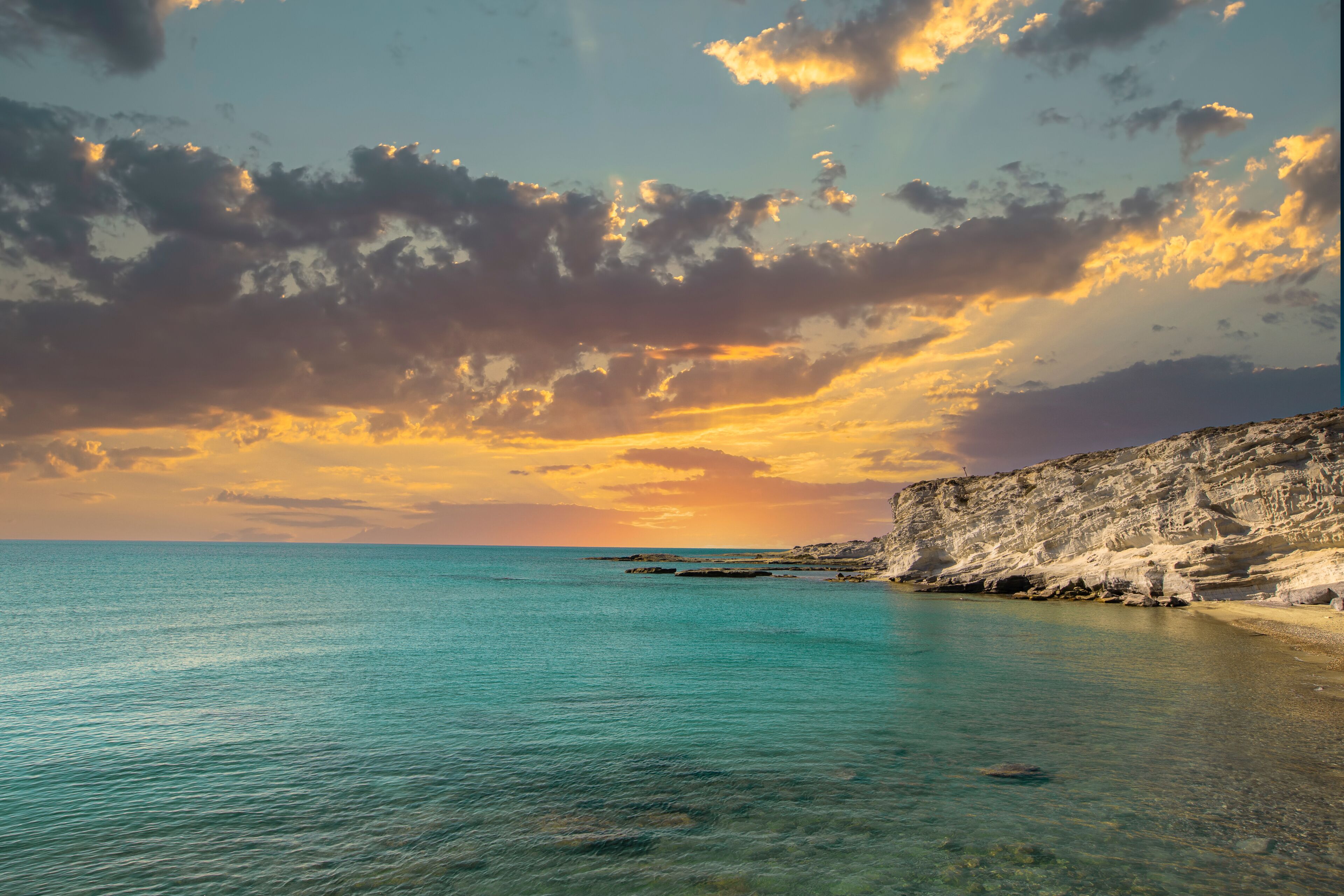 Turkey - Izmir -Çeşme District; Sunset at Delikli Bay beach, one of the beautiful beaches of Alaçatı..​
