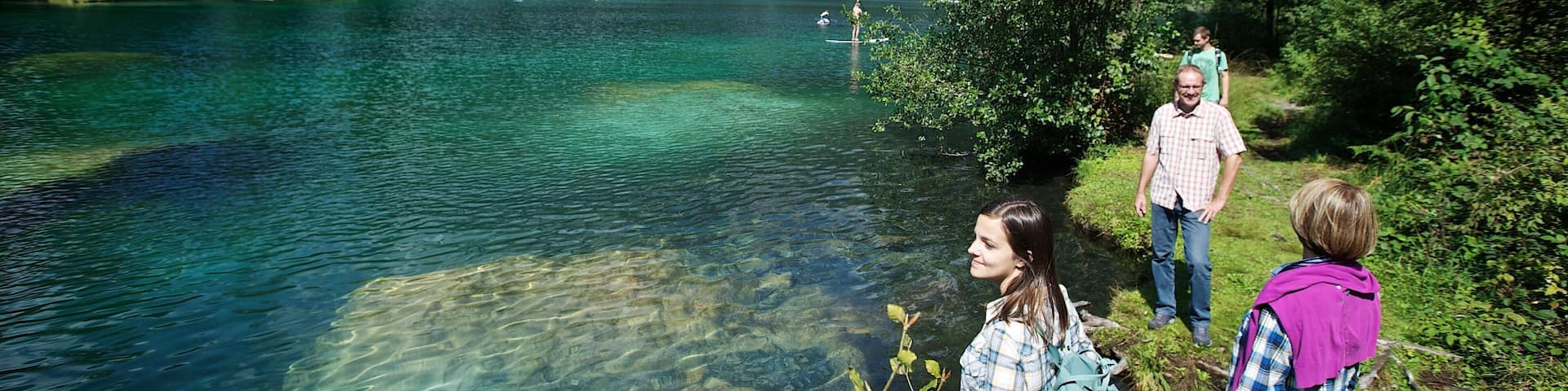 Flims which includes hiking or walking and a river or creek as well as a family