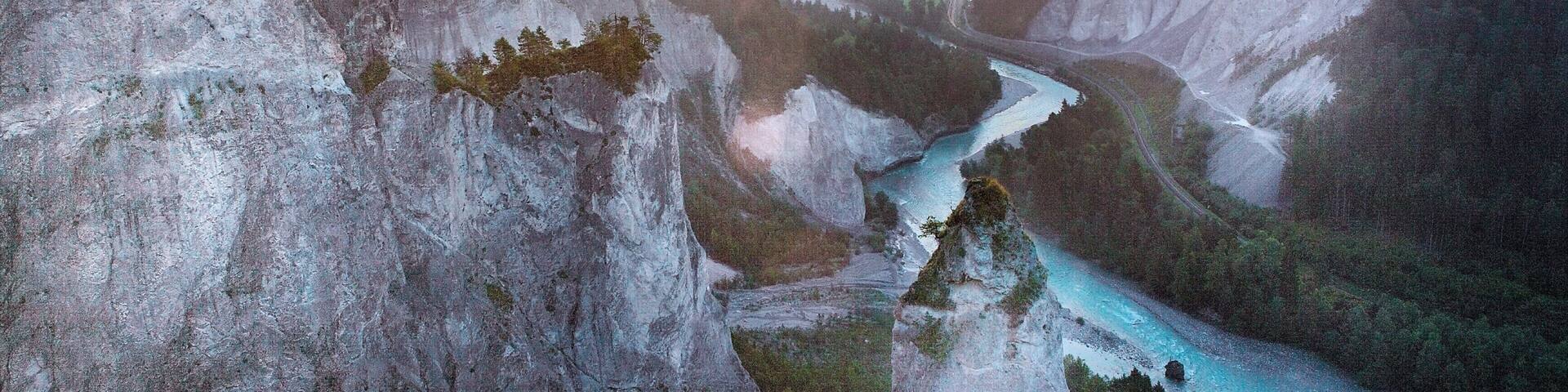 Flims which includes landscape views, a sunset and a river or creek