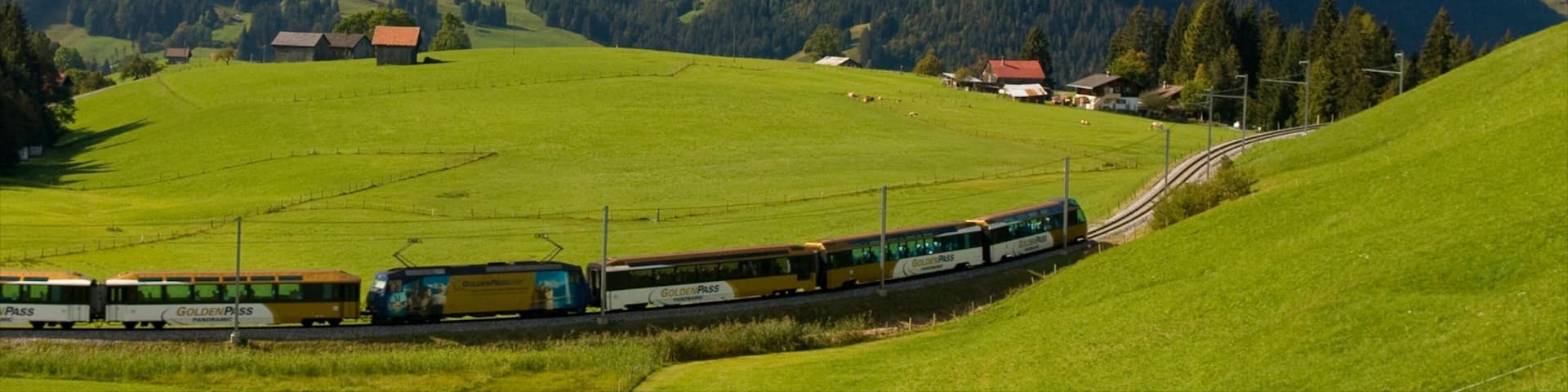 Gstaad featuring tranquil scenes, railway items and mountains