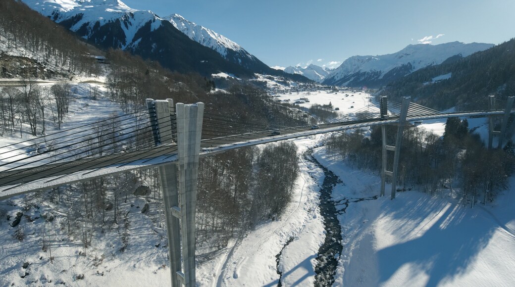Klosters-Serneus featuring a bridge, snow and tranquil scenes
