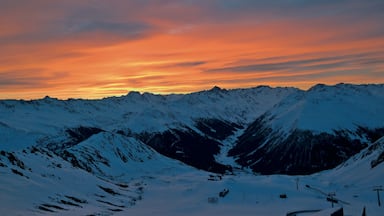 Klosters-Serneus which includes landscape views, a sunset and snow