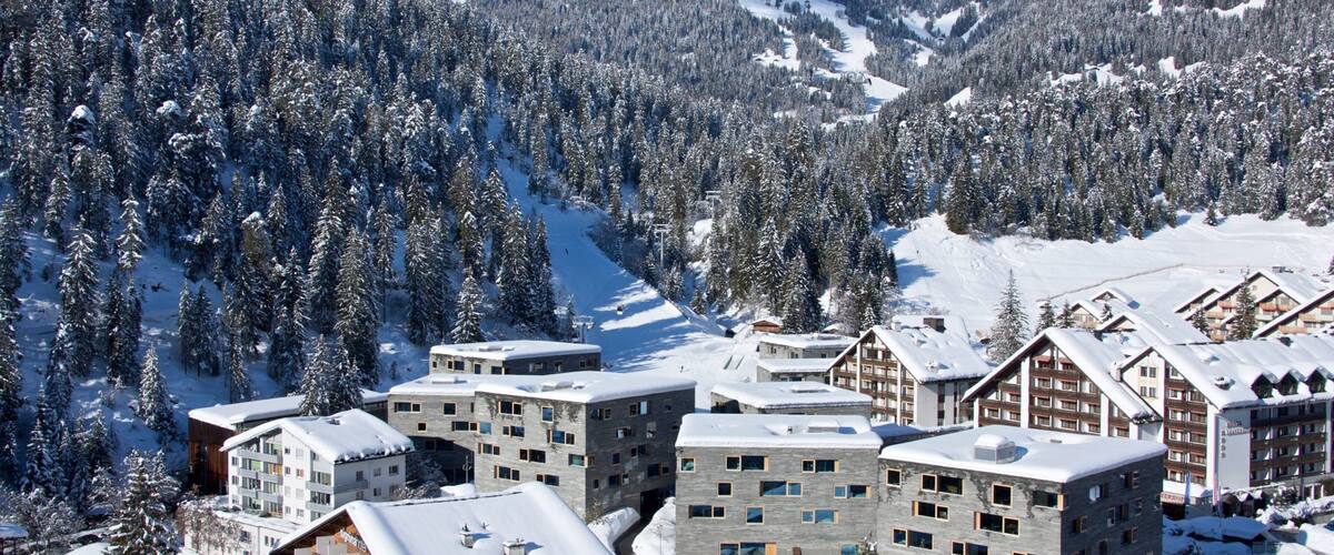 Flims which includes snow, landscape views and a small town or village