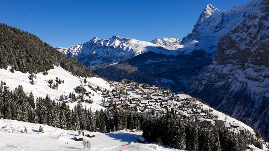 Muerren featuring snow, mountains and a small town or village
