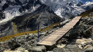 The hike from Corvatsch Station to the mountain hut Chamanna Coaz is just over 5.5 miles one way and provides uninterrupted views of mountains, glaciers, waterfalls, and lakes along the way. #mysummervacation #lifeatexpedia #hiking #mountains #Switzerland