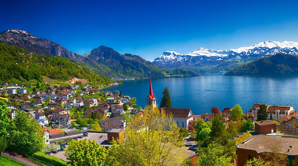 Panorama image of village Weggis, lake Lucerne (Vierwaldstatersee), Pilatus mountain and Swiss Alps in the background near famous Lucerne (Luzern) city, Switzerland