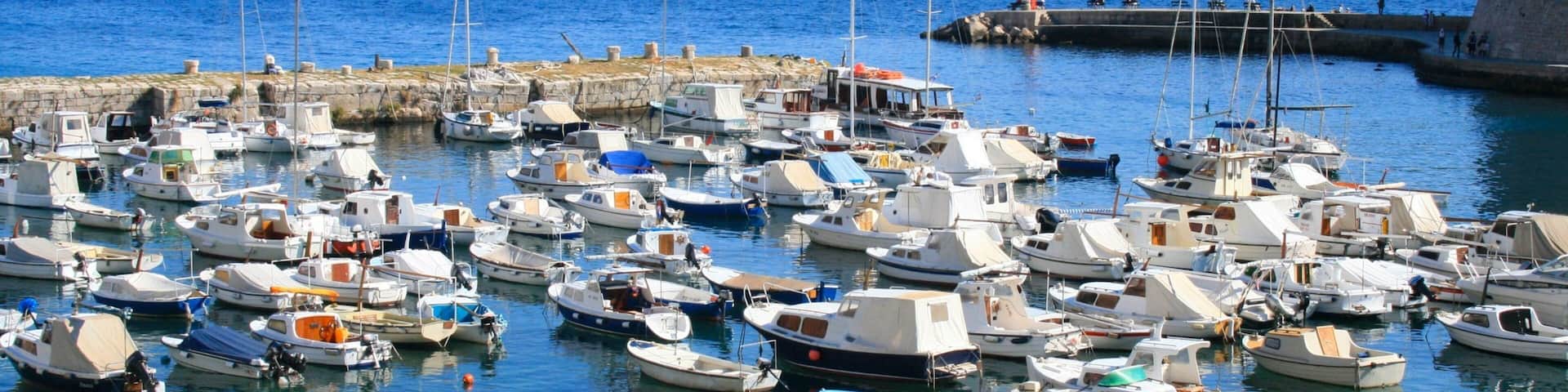 Croatia which includes boating and a bay or harbor