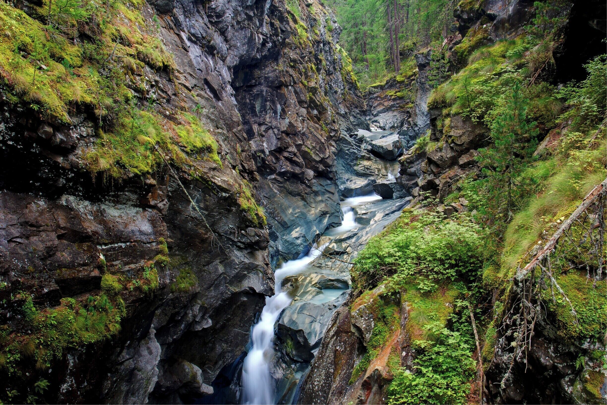 The Gornera River carving through Gorner gorge, you can walk through the gorge on an elevated walkway that loops around back into Zermatt.