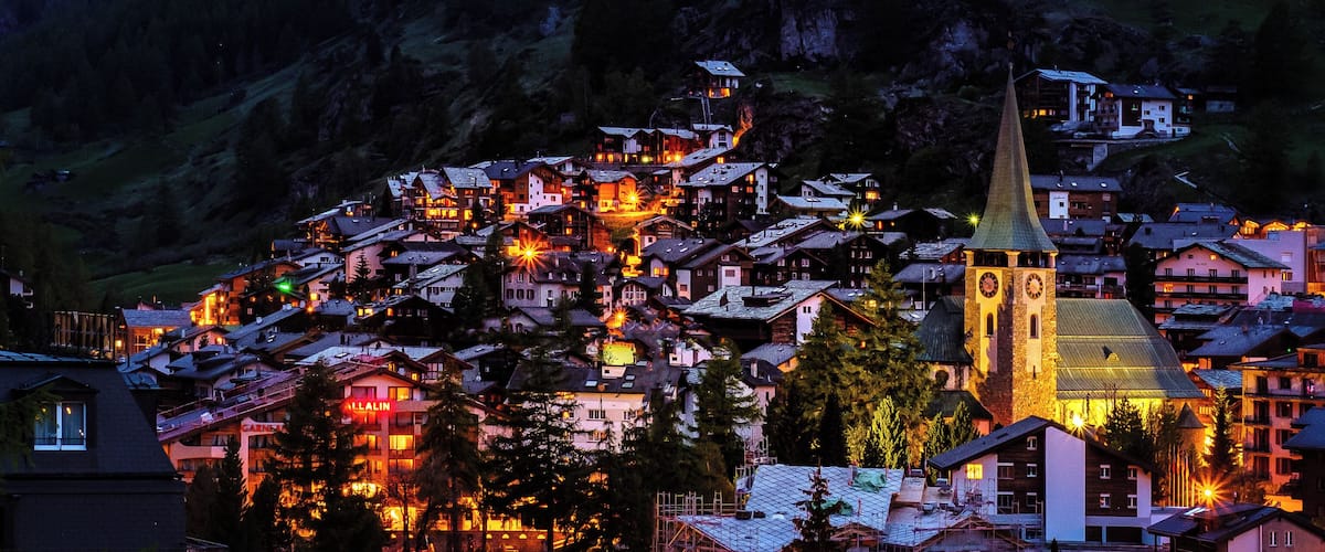 This photo is taken from the Riedweg. It's great for sunset and blue hour photos since it allows to frame both the village and the Matterhorn.