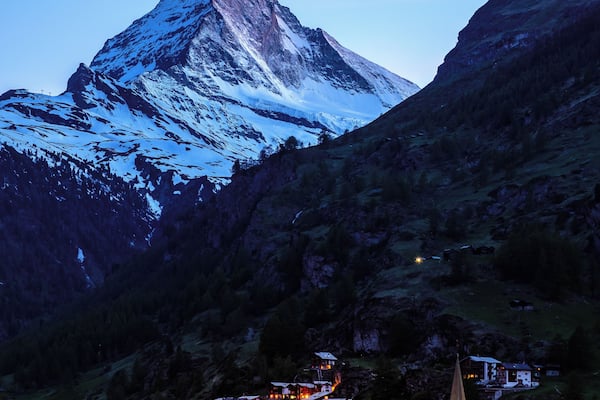 This photo is taken from the Riedweg. It's great for sunset and blue hour photos since it allows to frame both the village and the Matterhorn.