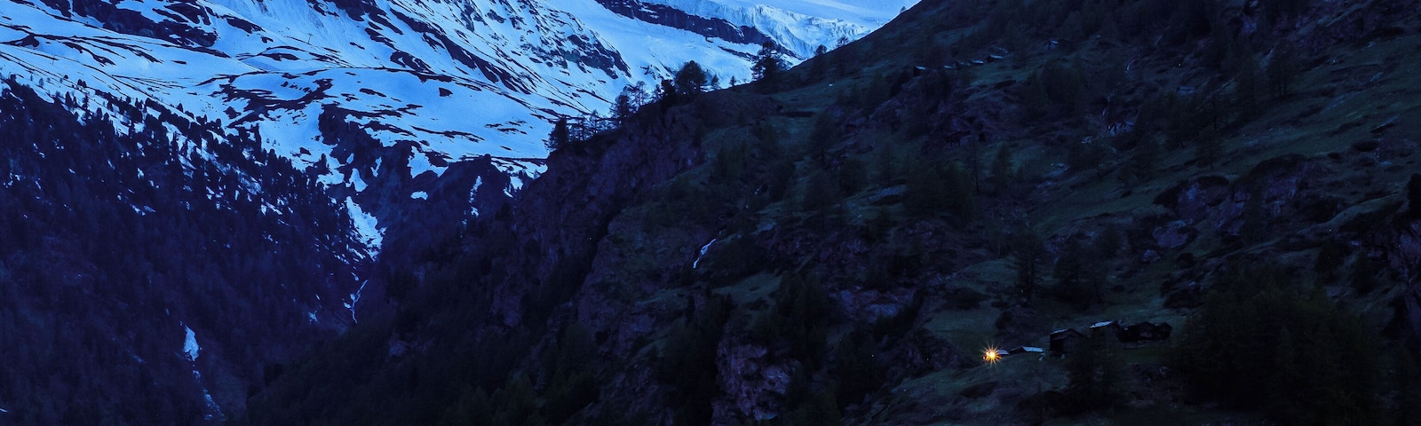 This photo is taken from the Riedweg. It's great for sunset and blue hour photos since it allows to frame both the village and the Matterhorn.