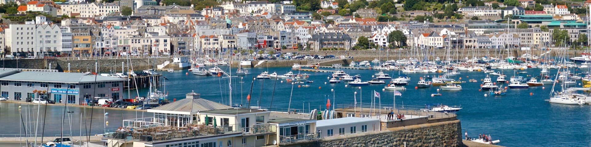 St. Peter Port which includes a bay or harbor and a coastal town