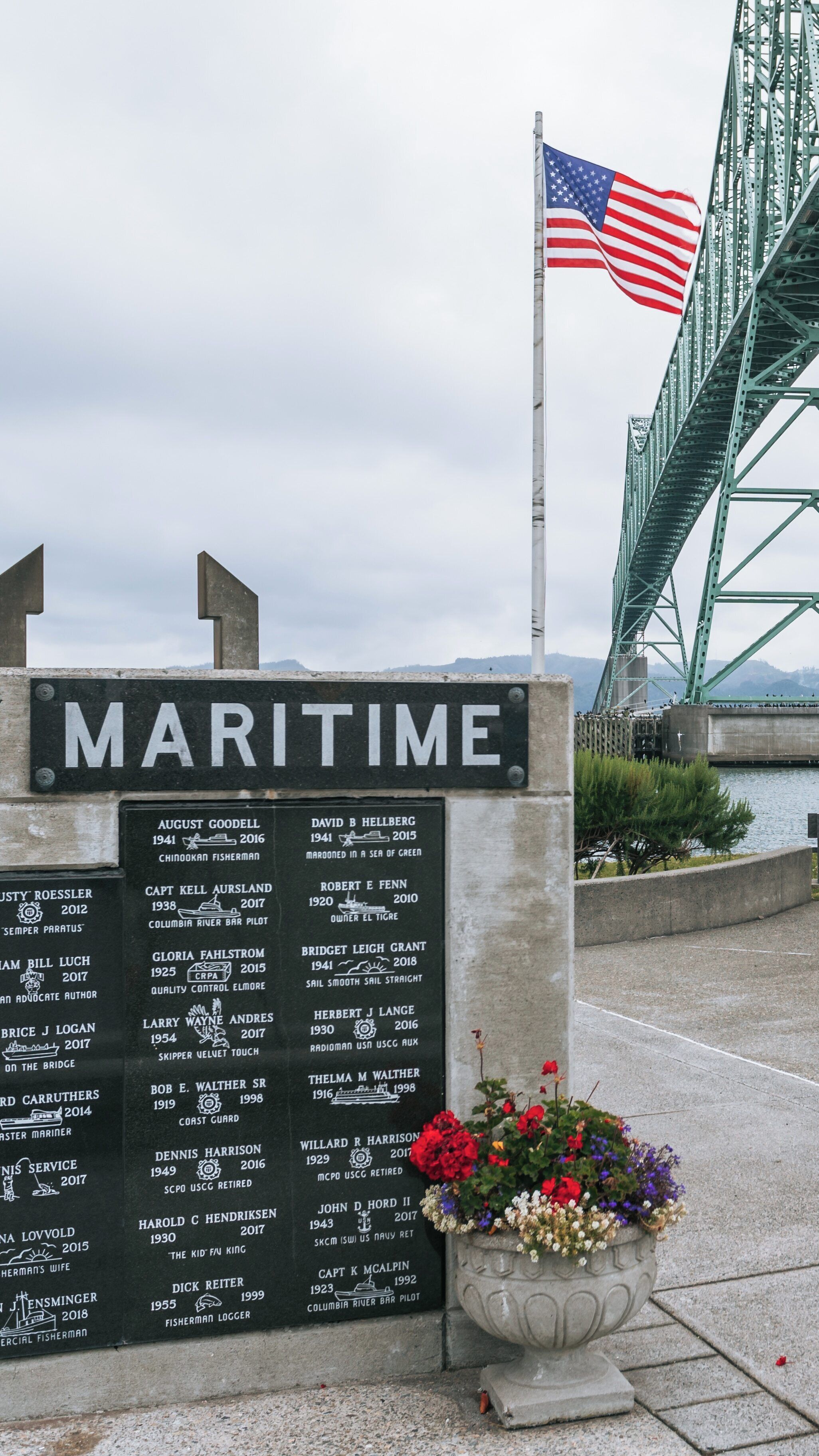 Maritime memorial and Columbia River bridge in Astoria, Oregon display rich local history and honor maritime contributions