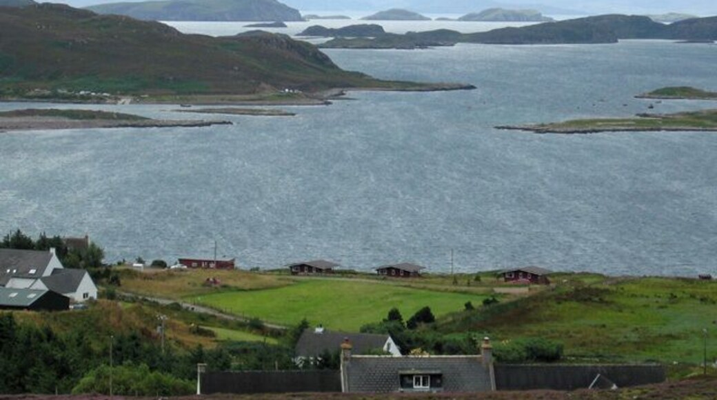 Altandhu A view over the shoreline at Altandhu and onwards across Loch an Alltain Duibh to the Summer Isles.