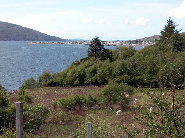 Looking down Loch Broom to Ullapool. The view from a roadside viewpoint on the shore of Loch Broom