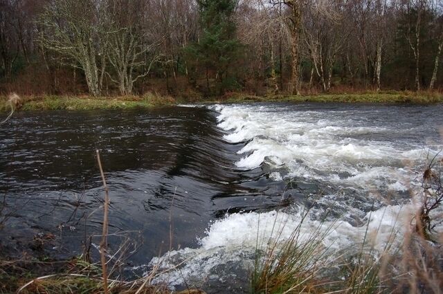 Weir on the River Snizort Viewed from Saint Columba's Isle across the wider of the two branches of the river that surround it.