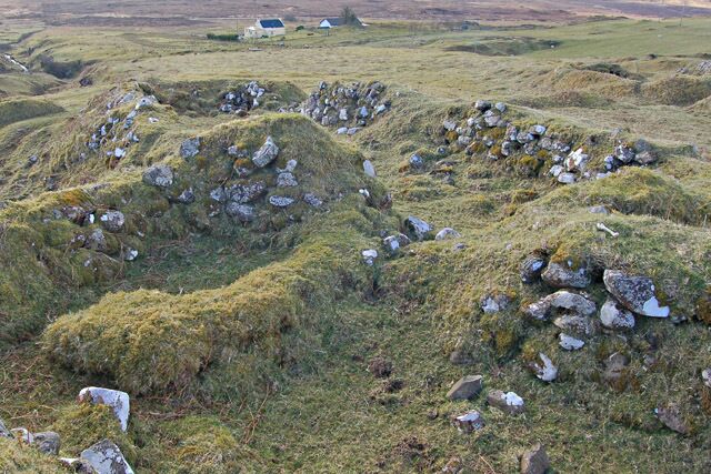 Ruined houses at Brescalan The remains of some of the houses of the township of Brescalan, which fell victim to the clearances of the nineteenth century. The ruins lie close to the northern end of the present day community of Borve.