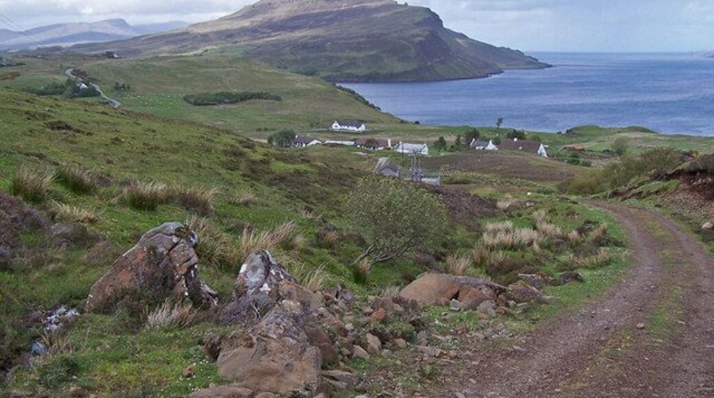 Track towards Lower Ollach The track provides access to the Braes water treatment plant. At the top of the track is a viewpoint at Farquhar's seat, above the Coille Iosal woodland. Beyond, the mountain is Ben Tianaviag.