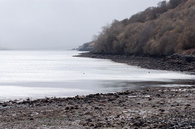 Coastline south of Camastianavaig With a big rain shower heading in from the Sound of Raasay.