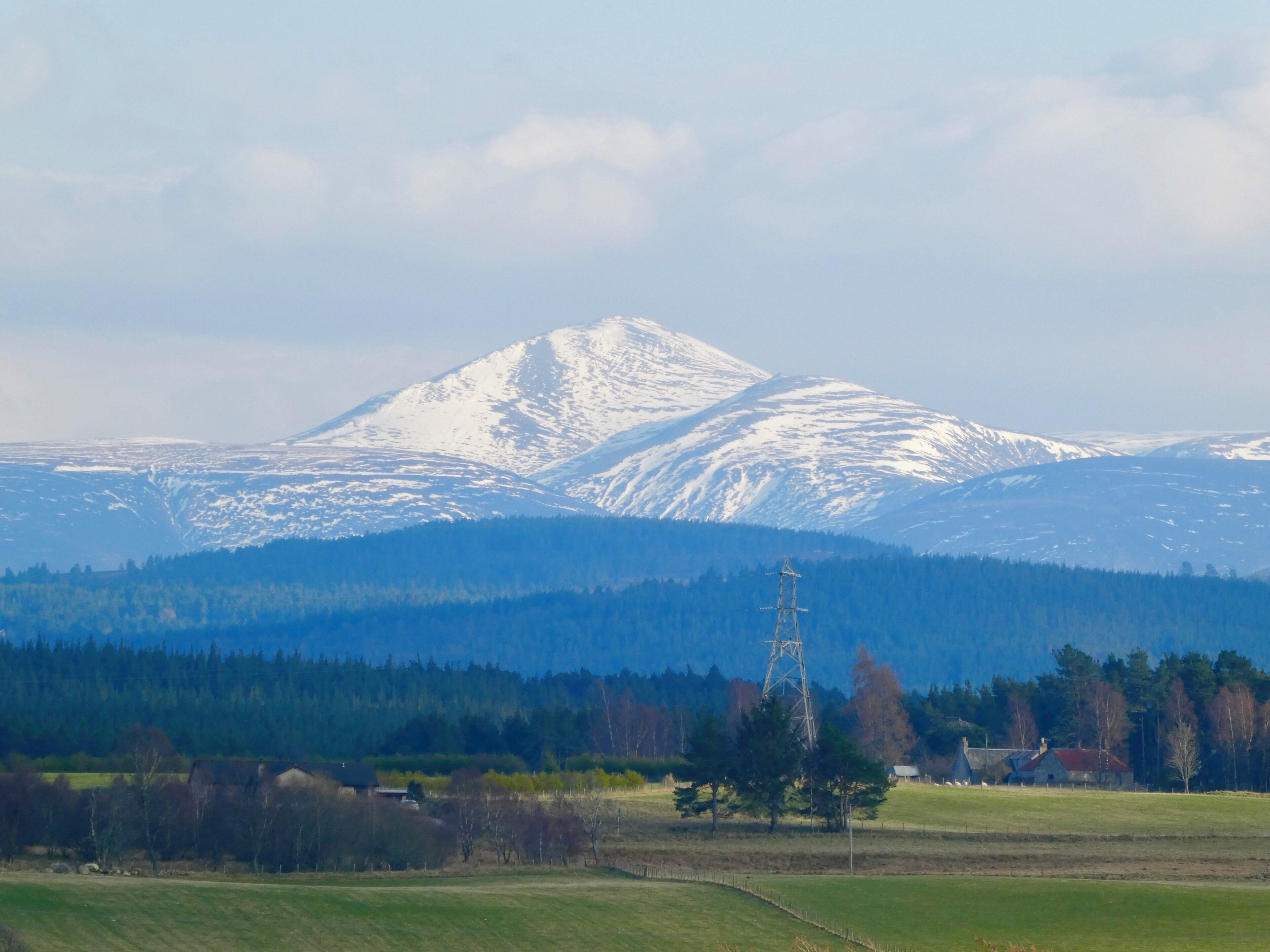 Snow covered peaks of the Cairngorm mountains.