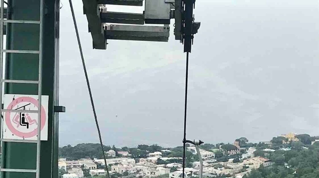 Steep one person chair lift up to the top for AMAZING views. Definitely worth doing. Tip - make friends and share a taxi to Anacapri vs waiting for the bus. So many people in line waiting, and if you fill a taxi it’s roughly the same price or negligible difference that makes it totally worth it.