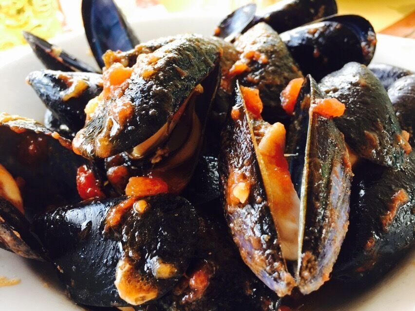 Laid back beach club and restaurant accessible by water taxi from positano.  Nice swimming for kids.  One of the best lunches I've ever had: mussel soup, homemade spaghetti with pesto, marinated anchovies.  And don't forget the chilled peach  wine!  Come for a great day. 