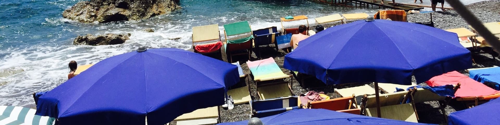 Laid back beach club and restaurant accessible by water taxi from positano. Nice swimming for kids. One of the best lunches I've ever had: mussel soup, homemade spaghetti with pesto, marinated anchovies. And don't forget the chilled peach wine! Come for a great day.