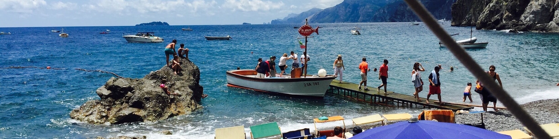 Laid back beach club and restaurant accessible by water taxi from positano. Nice swimming for kids. One of the best lunches I've ever had: mussel soup, homemade spaghetti with pesto, marinated anchovies. And don't forget the chilled peach wine! Come for a great day.