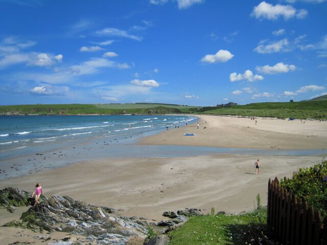 Sandend Bay Sandend lying to the west of Sandend Bay is one of the smallest of the many old fishing villages scattered along the north-facing coasts of Moray and Aberdeenshire. Sandend beach is popular with families and for surfers, especially on a day like this. At its east end, on the horizon, lies Glenglassaugh Distillery which, once again, is producing its distinctive single malt whisky after being mothballed in 1986. In the dark days of the second world war the beach was regarded as being suitable for a landing ground for the Germans and was fortified with a double row of tank traps and a gun emplacement at the east end.