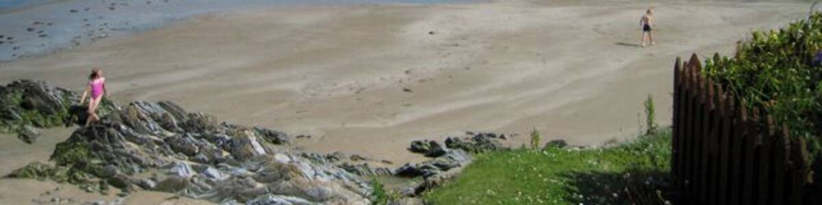 Sandend Bay Sandend lying to the west of Sandend Bay is one of the smallest of the many old fishing villages scattered along the north-facing coasts of Moray and Aberdeenshire. Sandend beach is popular with families and for surfers, especially on a day like this. At its east end, on the horizon, lies Glenglassaugh Distillery which, once again, is producing its distinctive single malt whisky after being mothballed in 1986. In the dark days of the second world war the beach was regarded as being suitable for a landing ground for the Germans and was fortified with a double row of tank traps and a gun emplacement at the east end.