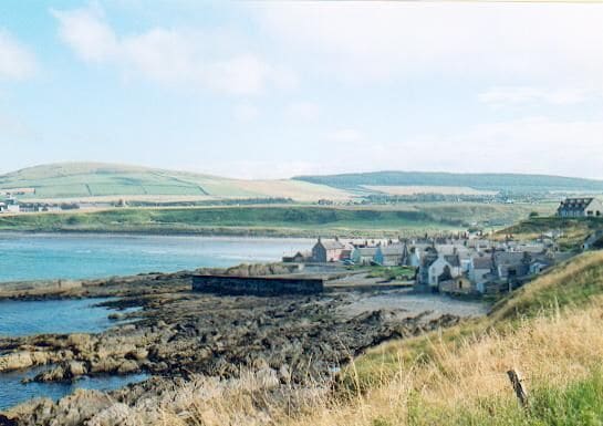 Sandend from the coast path. One of the smallest and most attractive of the old 'herring villages' on the Buchan coast.