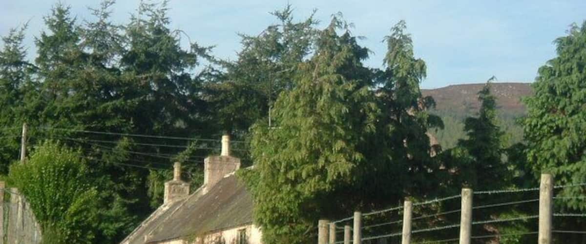 Cottages off A70 South of Hill of Fare; north of Brathens wood.