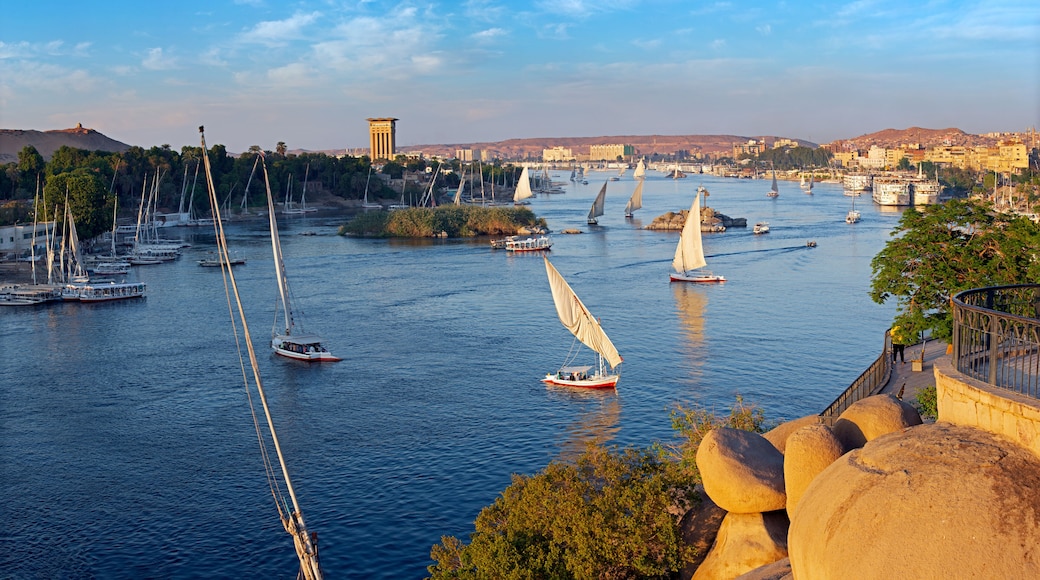 Beautiful panorama landscape with felucca boats on Nile river in Aswan at sunset, Egypt