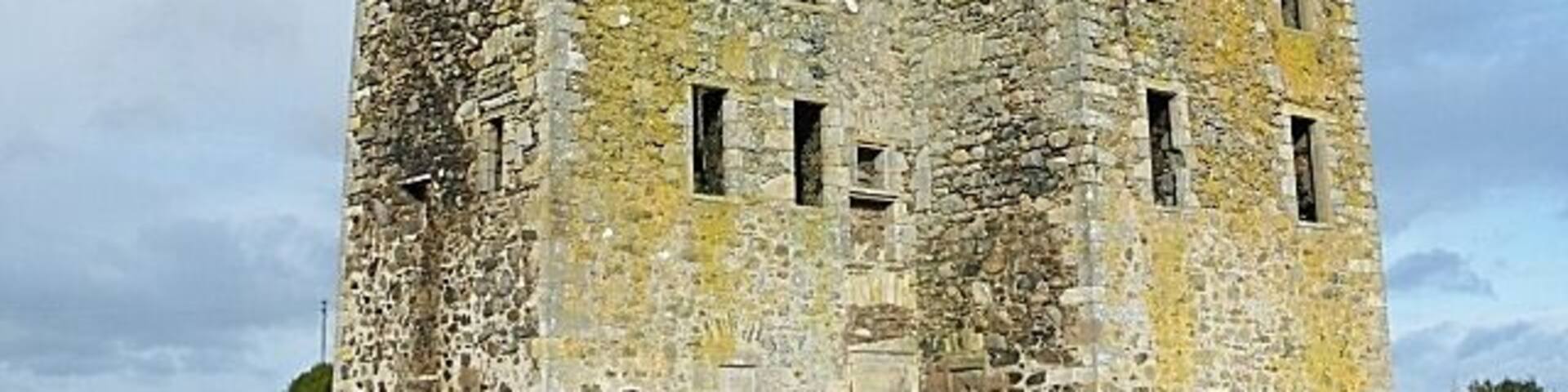 Knockhall Castle Rather a fortified house than a castle, this is an L-plan tower house with an extra wing on the rear. There are gunloops at ground level, and windows only in the upper storeys. The door has been walled up to prevent access.