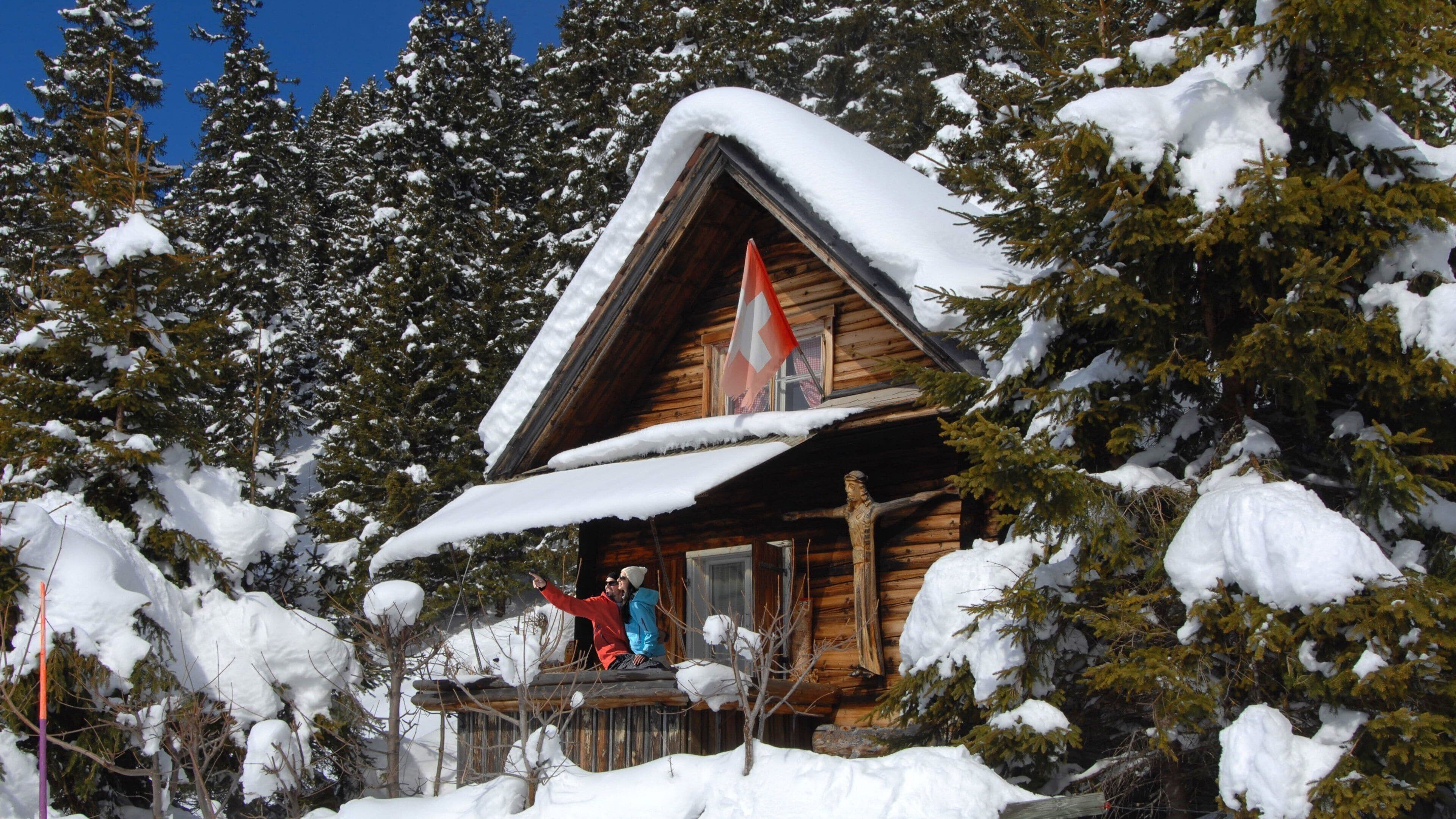 Engelberg que incluye nieve, escenas forestales y un hotel o resort de lujo
